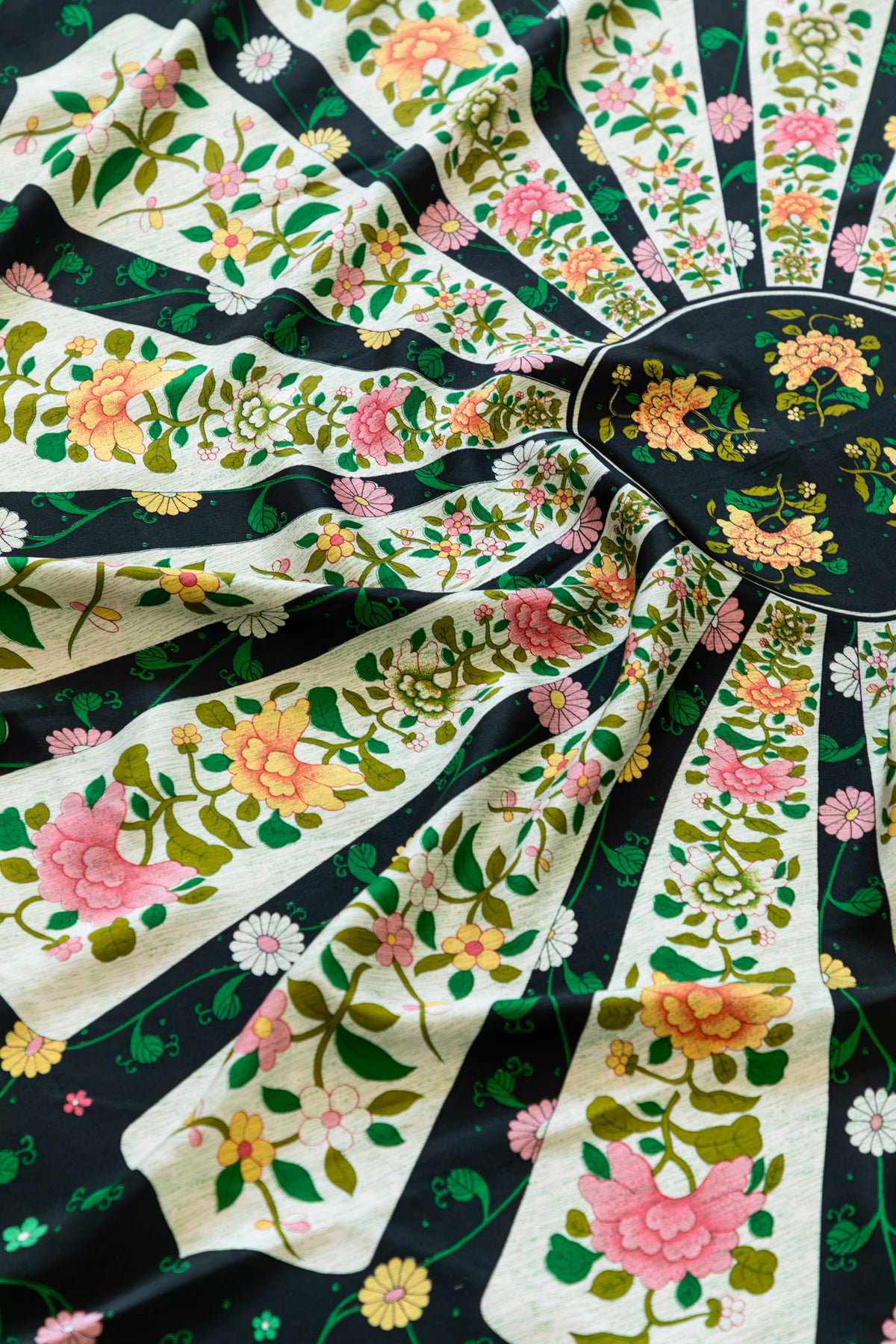 Close-up of hand-printed floral detail on 100% heavy twill silk scarf